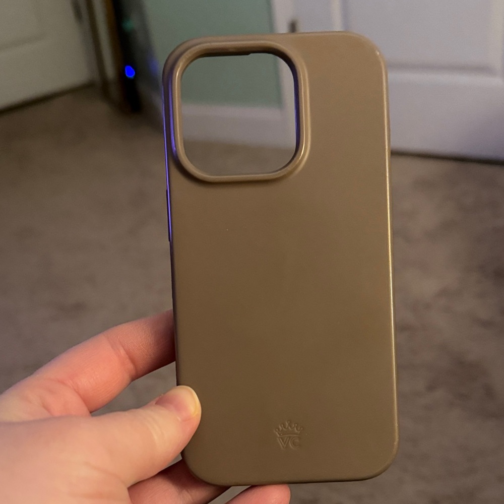 Tan Velvet Cavier iPhone 14 Pro case in great condition